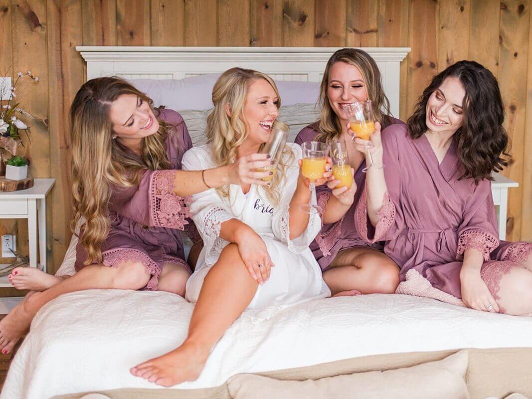 West Virginia bride and bridesmaids enjoying cocktails before a wedding. Photographed by Katelyn Workman Photography.