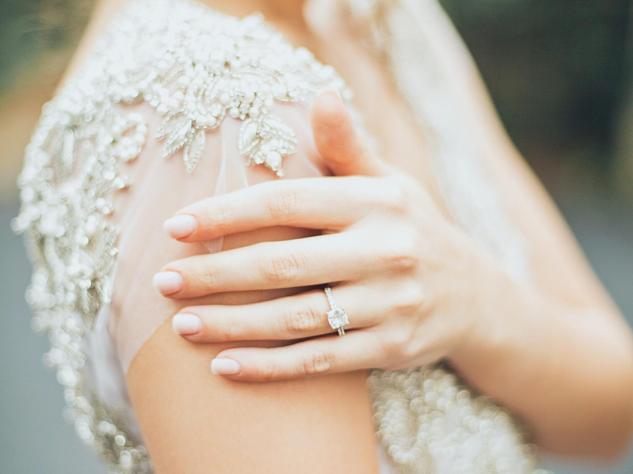 Bride on wedding day with engagement ring pictured. 

West Virginia Weddings