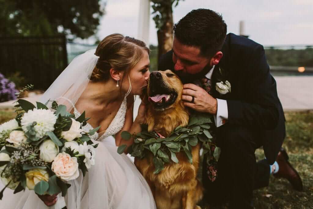 WV Wedding couple, bride and groom, on wedding day with dog in Shepherdstown. Photographed by Kelci Alane Photography.